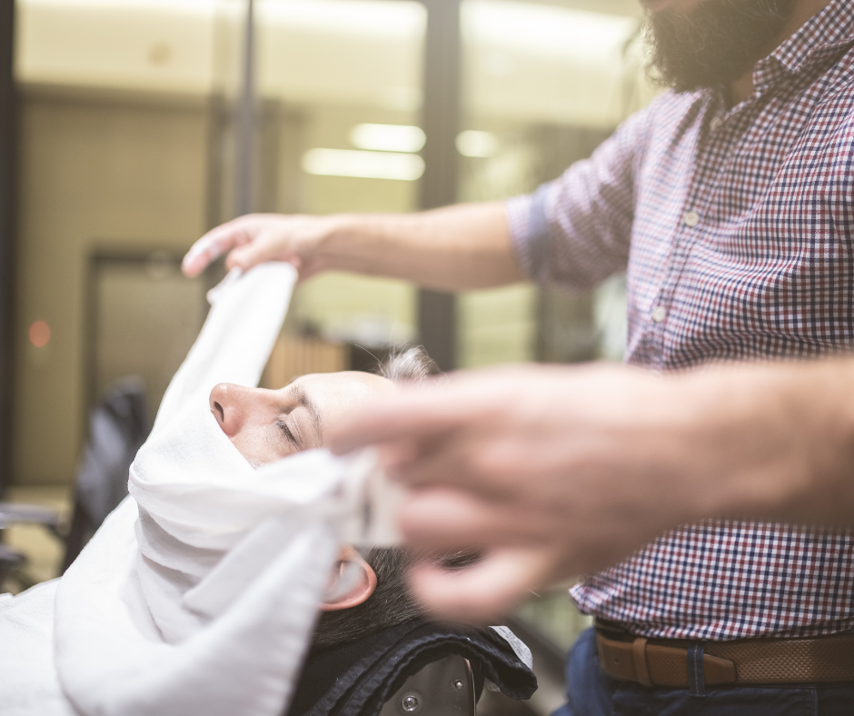 Hot towel beard shave service at house of handsome barbershop on Whyte Ave in Edmonton's Entertainment District.